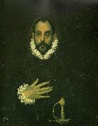 man with his hand on his breast El Greco